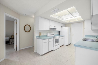 Welcome to this charming and well-maintained 2-bedroom, 2-bath on Oak Hills Country Club in Florida - for sale on GolfHomes.com, golf home, golf lot