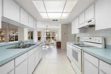 Welcome to this charming and well-maintained 2-bedroom, 2-bath on Oak Hills Country Club in Florida - for sale on GolfHomes.com, golf home, golf lot