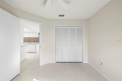 Welcome to this charming and well-maintained 2-bedroom, 2-bath on Oak Hills Country Club in Florida - for sale on GolfHomes.com, golf home, golf lot