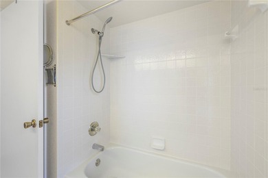 Welcome to this charming and well-maintained 2-bedroom, 2-bath on Oak Hills Country Club in Florida - for sale on GolfHomes.com, golf home, golf lot