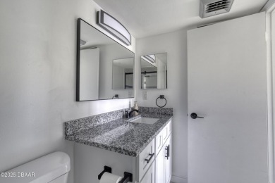 Embrace the best Florida lifestyle in this beautifully updated on Oceans Golf Club in Florida - for sale on GolfHomes.com, golf home, golf lot