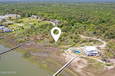 Highly coveted intracoastal waterway homesite could now be yours on Lockwood Folly Country Club in North Carolina - for sale on GolfHomes.com, golf home, golf lot