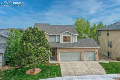 Two story with walk-out basement and 3 car garage in School on Pine Creek Golf Club in Colorado - for sale on GolfHomes.com, golf home, golf lot