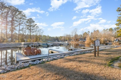 Welcome to your LAKE DREAM home in the coveted gated community on River Golf and County Club at Lake Royale in North Carolina - for sale on GolfHomes.com, golf home, golf lot