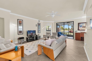 Enjoy a first-floor end-unit coach home with beautiful lake on The Rookery At Marco in Florida - for sale on GolfHomes.com, golf home, golf lot