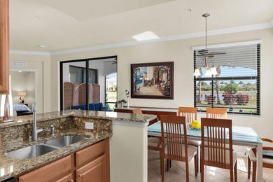 Enjoy a first-floor end-unit coach home with beautiful lake on The Rookery At Marco in Florida - for sale on GolfHomes.com, golf home, golf lot