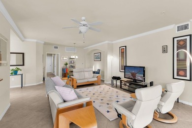 Enjoy a first-floor end-unit coach home with beautiful lake on The Rookery At Marco in Florida - for sale on GolfHomes.com, golf home, golf lot