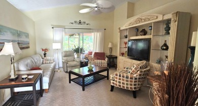 This delightful, well-kept, 2 bed, 2 bath home is ready and on Spanish Lakes Fairways in Florida - for sale on GolfHomes.com, golf home, golf lot