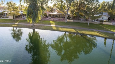 Spectacular lake views from this 3BR, 2BA Alameda model in the on Cottonwood Country Club in Arizona - for sale on GolfHomes.com, golf home, golf lot