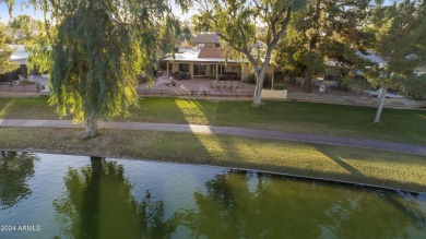 Spectacular lake views from this 3BR, 2BA Alameda model in the on Cottonwood Country Club in Arizona - for sale on GolfHomes.com, golf home, golf lot