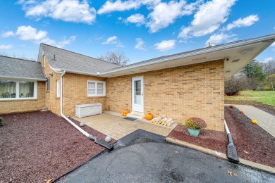 FIVE BEDROOM, expansive first floor home on ALMOST 5.0 acres in on Hickory Hills Golf Club in Michigan - for sale on GolfHomes.com, golf home, golf lot