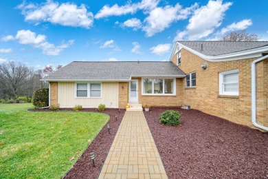 FIVE BEDROOM, expansive first floor home on ALMOST 5.0 acres in on Hickory Hills Golf Club in Michigan - for sale on GolfHomes.com, golf home, golf lot