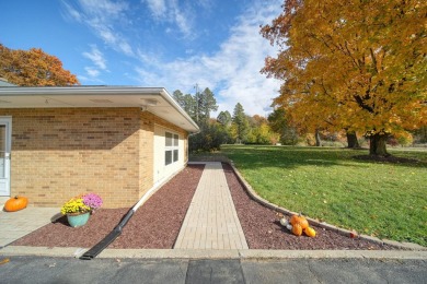 FIVE BEDROOM, expansive first floor home on ALMOST 5.0 acres in on Hickory Hills Golf Club in Michigan - for sale on GolfHomes.com, golf home, golf lot