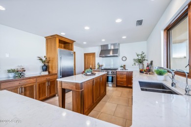 This is more than a remodel--it's a one-of-a-kind architectural on London Bridge Golf Course in Arizona - for sale on GolfHomes.com, golf home, golf lot
