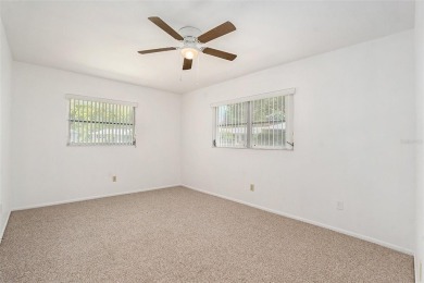 Fully remodeled and move-in ready -- bring on the offers! This on Highland Lakes Executive Golf Course in Florida - for sale on GolfHomes.com, golf home, golf lot