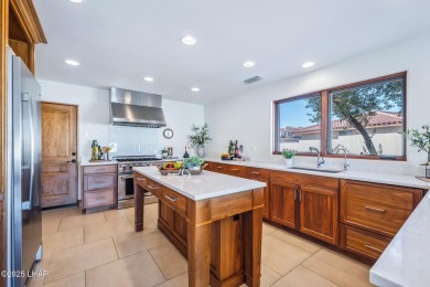 This is more than a remodel--it's a one-of-a-kind architectural on London Bridge Golf Course in Arizona - for sale on GolfHomes.com, golf home, golf lot