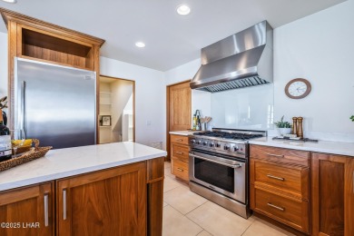 This is more than a remodel--it's a one-of-a-kind architectural on London Bridge Golf Course in Arizona - for sale on GolfHomes.com, golf home, golf lot