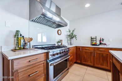 This is more than a remodel--it's a one-of-a-kind architectural on London Bridge Golf Course in Arizona - for sale on GolfHomes.com, golf home, golf lot