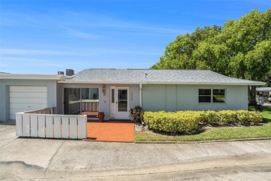 Fully remodeled and move-in ready -- bring on the offers! This on Highland Lakes Executive Golf Course in Florida - for sale on GolfHomes.com, golf home, golf lot