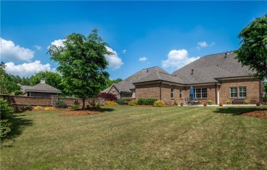 Welcome Home! Nestled in a highly sought-after gated Active on The Standard Club in Georgia - for sale on GolfHomes.com, golf home, golf lot