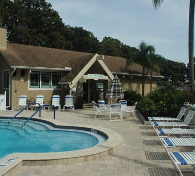 Fully remodeled and move-in ready -- bring on the offers! This on Highland Lakes Executive Golf Course in Florida - for sale on GolfHomes.com, golf home, golf lot