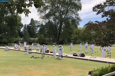 Reintroduced at $889,000, this updated 3BR/3BA Rossmoor townhome on Rossmoor Golf Course in California - for sale on GolfHomes.com, golf home, golf lot