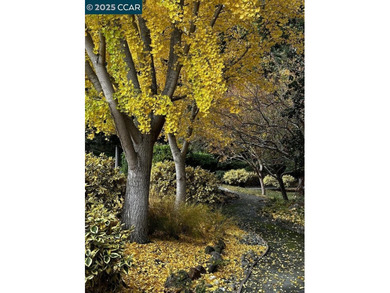 Reintroduced at $889,000, this updated 3BR/3BA Rossmoor townhome on Rossmoor Golf Course in California - for sale on GolfHomes.com, golf home, golf lot