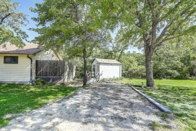 Discover the charm of this unique Ralph Lauren Cottage-inspired on Nocona Hills Golf Course in Texas - for sale on GolfHomes.com, golf home, golf lot
