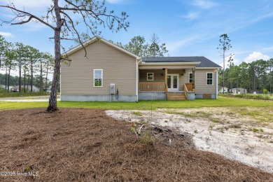 Fresh, flawless, and brand new! Skip the construction wait on The Lakes Country Club in North Carolina - for sale on GolfHomes.com, golf home, golf lot