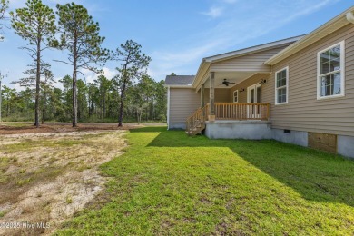 Fresh, flawless, and brand new! Skip the construction wait on The Lakes Country Club in North Carolina - for sale on GolfHomes.com, golf home, golf lot