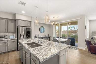 Elevated living awaits in this highly upgraded ground-level on Revere Golf Club in Nevada - for sale on GolfHomes.com, golf home, golf lot