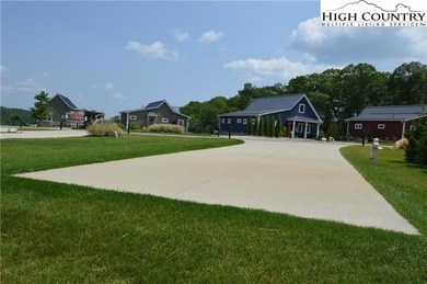 Experience the beauty of the Blue Ridge Mountains at The Village on Olde Beau Golf Course in North Carolina - for sale on GolfHomes.com, golf home, golf lot