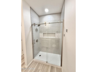 Experience refined, single-story living in this spacious 2,338 on The Grand Club Cypress Course in Florida - for sale on GolfHomes.com, golf home, golf lot