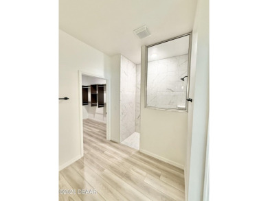 Experience refined, single-story living in this spacious 2,338 on The Grand Club Cypress Course in Florida - for sale on GolfHomes.com, golf home, golf lot