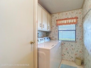 Introducing a beautifully maintained property in the exclusive on Brookridge Country Club in Florida - for sale on GolfHomes.com, golf home, golf lot