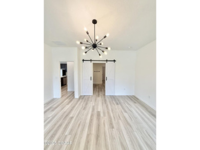 Experience refined, single-story living in this spacious 2,338 on The Grand Club Cypress Course in Florida - for sale on GolfHomes.com, golf home, golf lot