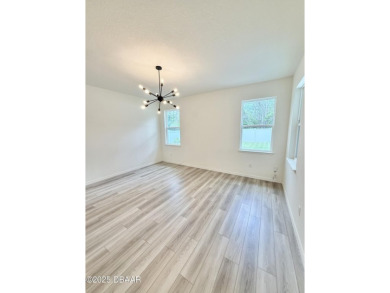 Experience refined, single-story living in this spacious 2,338 on The Grand Club Cypress Course in Florida - for sale on GolfHomes.com, golf home, golf lot