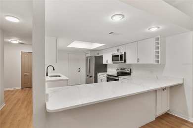 Enjoy easy, maintenance-free living in this beautifully restored on Turkey Creek Golf and Country Club in Florida - for sale on GolfHomes.com, golf home, golf lot