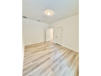 Experience refined, single-story living in this spacious 2,338 on The Grand Club Cypress Course in Florida - for sale on GolfHomes.com, golf home, golf lot