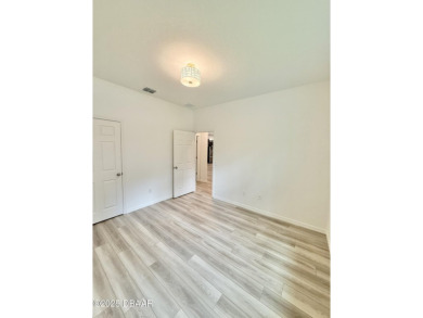 Experience refined, single-story living in this spacious 2,338 on The Grand Club Cypress Course in Florida - for sale on GolfHomes.com, golf home, golf lot