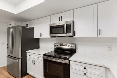 Enjoy easy, maintenance-free living in this beautifully restored on Turkey Creek Golf and Country Club in Florida - for sale on GolfHomes.com, golf home, golf lot