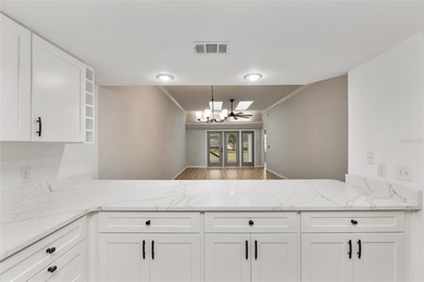 Enjoy easy, maintenance-free living in this beautifully restored on Turkey Creek Golf and Country Club in Florida - for sale on GolfHomes.com, golf home, golf lot