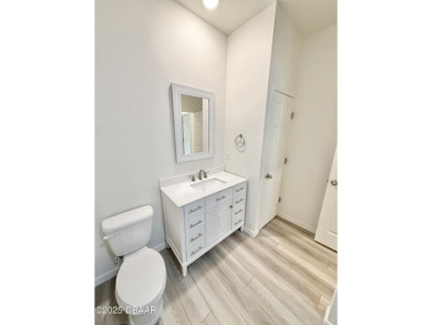 Experience refined, single-story living in this spacious 2,338 on The Grand Club Cypress Course in Florida - for sale on GolfHomes.com, golf home, golf lot