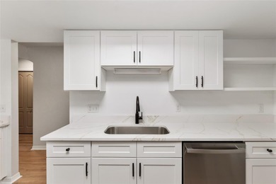 Enjoy easy, maintenance-free living in this beautifully restored on Turkey Creek Golf and Country Club in Florida - for sale on GolfHomes.com, golf home, golf lot