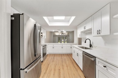 Enjoy easy, maintenance-free living in this beautifully restored on Turkey Creek Golf and Country Club in Florida - for sale on GolfHomes.com, golf home, golf lot