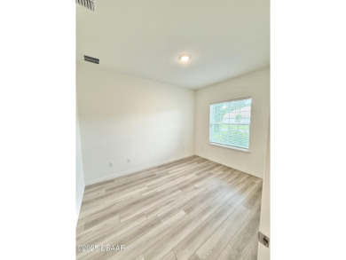 Experience refined, single-story living in this spacious 2,338 on The Grand Club Cypress Course in Florida - for sale on GolfHomes.com, golf home, golf lot