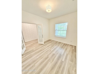 Experience refined, single-story living in this spacious 2,338 on The Grand Club Cypress Course in Florida - for sale on GolfHomes.com, golf home, golf lot