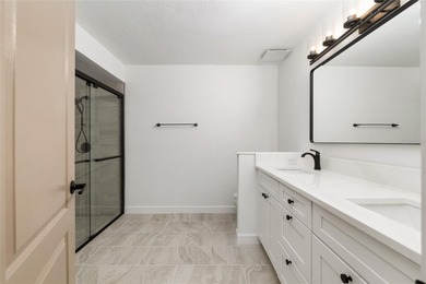 Enjoy easy, maintenance-free living in this beautifully restored on Turkey Creek Golf and Country Club in Florida - for sale on GolfHomes.com, golf home, golf lot