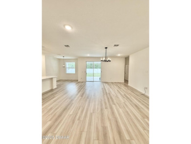 Experience refined, single-story living in this spacious 2,338 on The Grand Club Cypress Course in Florida - for sale on GolfHomes.com, golf home, golf lot