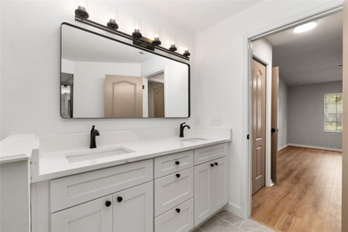 Enjoy easy, maintenance-free living in this beautifully restored on Turkey Creek Golf and Country Club in Florida - for sale on GolfHomes.com, golf home, golf lot